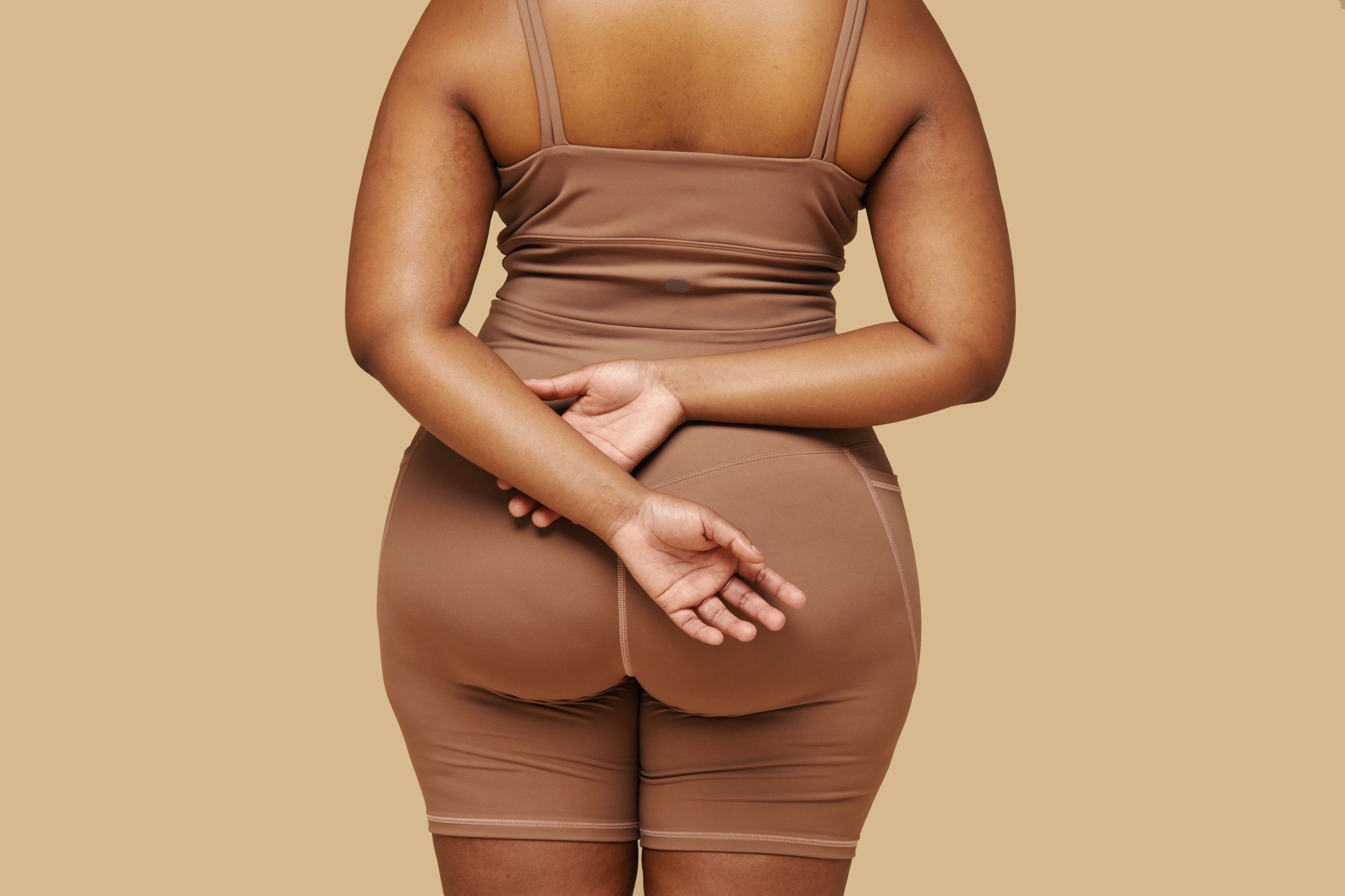 Back view of a woman wearing a matching shapewear set.jpeg